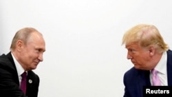 Дональд Трамп и Владимир Путин, июнь 2019 года